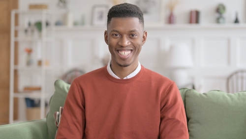 african-american man smiling at the camera