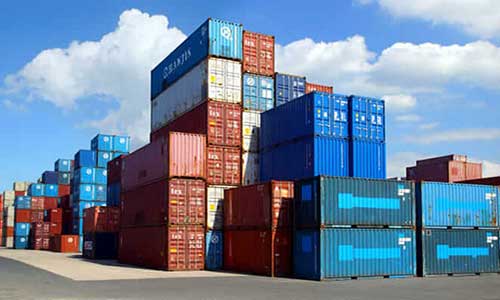 stacks of cargo containers on a yard