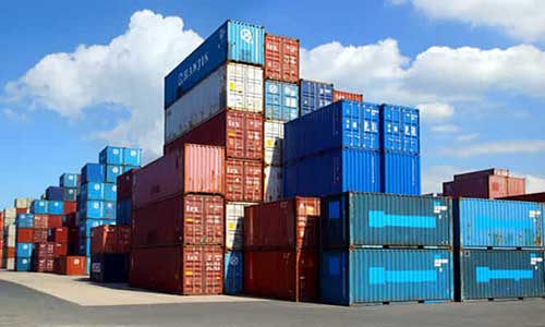 stacks of cargo containers on a yard