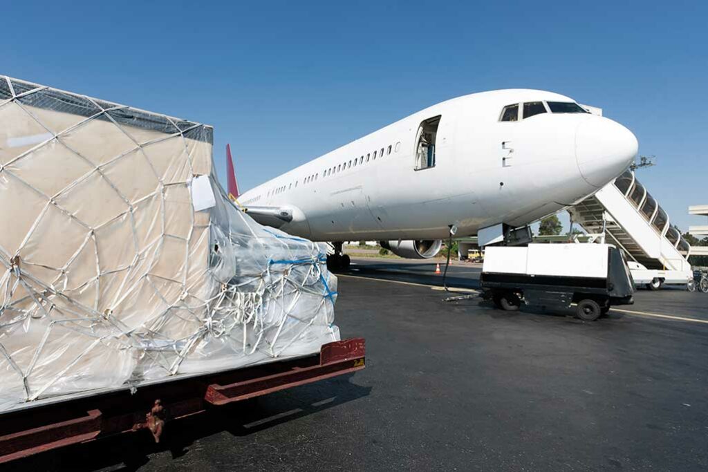 white plane and a package on the foreground