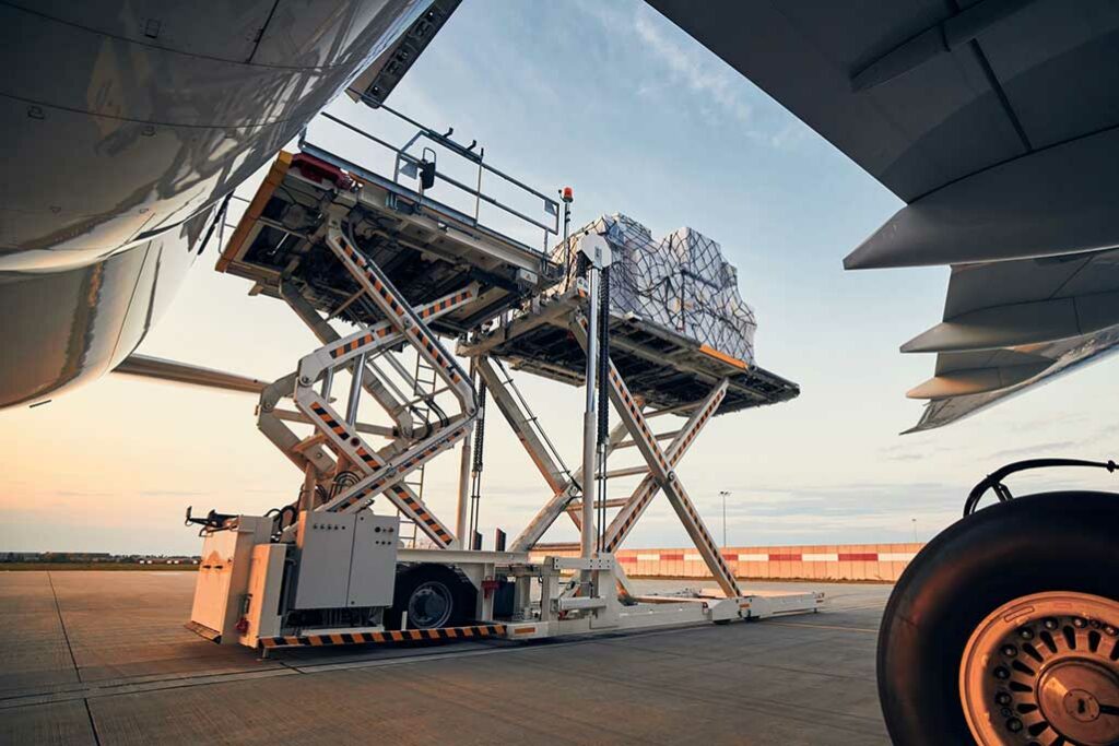 image of a plane being loaded with cargo