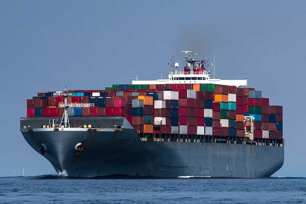 large cargo ship stacked with storage containers